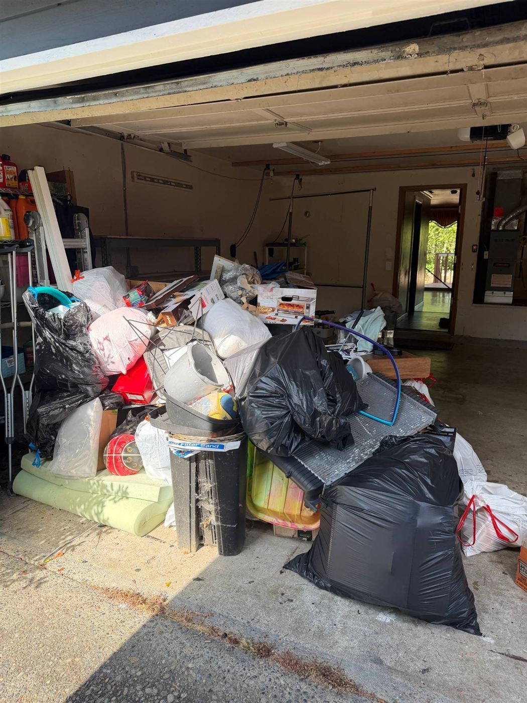 Pile of bags and junk cleared from a Edmonds garage